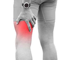 A person clutching their thigh, showing red coloring to suggest muscle pain