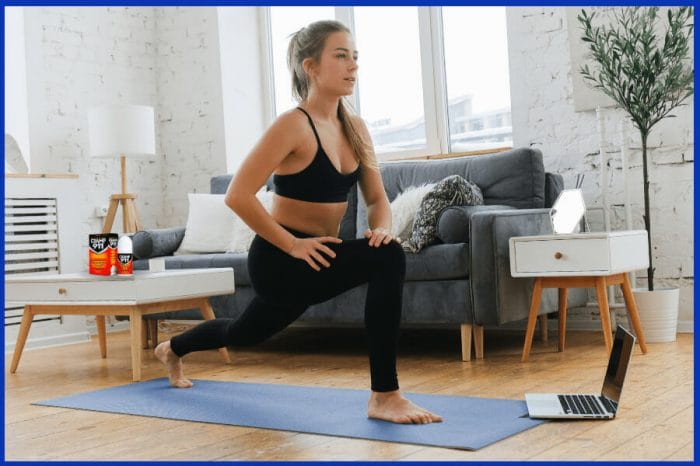 Woman performing stretching exercises to relieve leg cramps